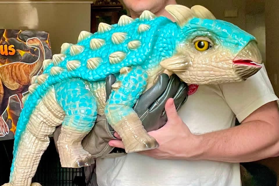 Dino Mike with dinosaur puppet